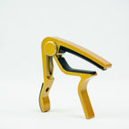 CAPO P/GUITARRA FOLK DORADO