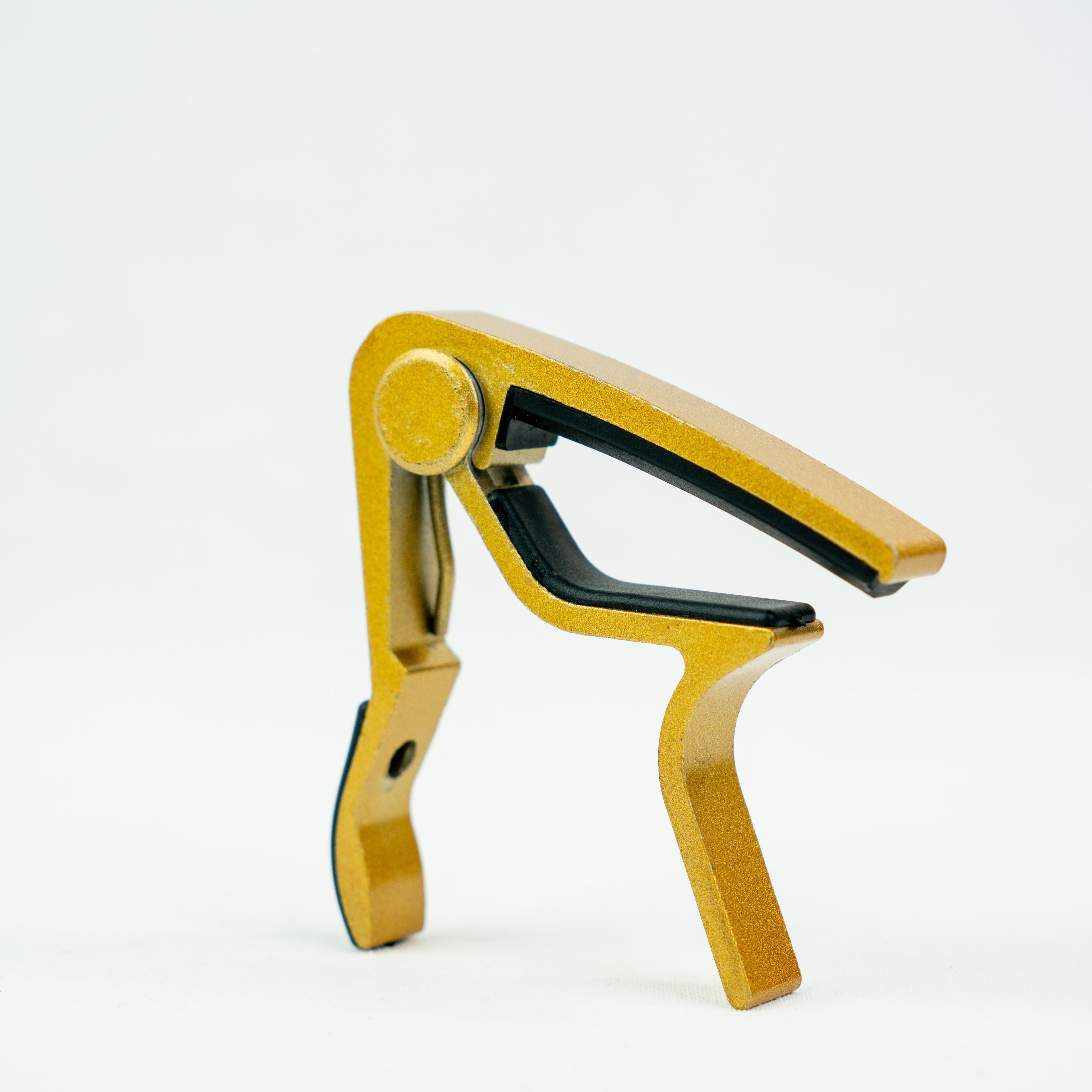 CAPO P/GUITARRA FOLK DORADO
