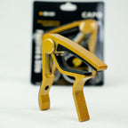 CAPO P/GUITARRA FOLK DORADO